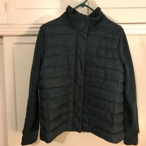 Puffer jacket with sweater sleeves